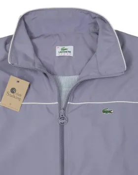 CAZADORA CORTAVIENTOS LACOSTE LILA