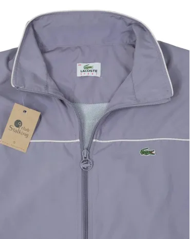 CAZADORA CORTAVIENTOS LACOSTE LILA