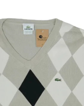 JERSEY PICO LACOSTE HOMBRE BEIGE Y NEGRO