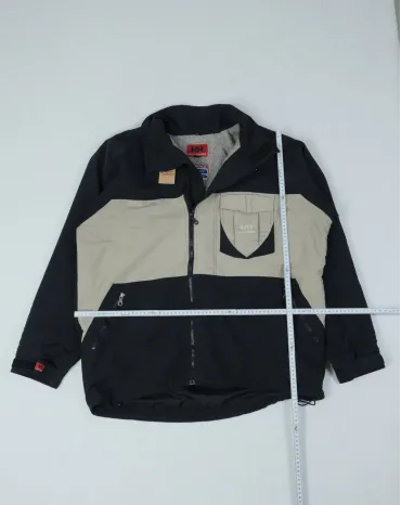 CHAQUETA TÉCNICA HELLY HANSEN UNISEX NEGRO Y BEIGE
